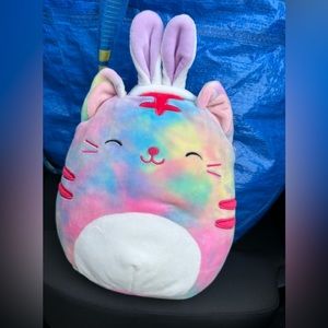 In case you missed it this Easter, Squishmallow Easter Tie Dye Cat Bunny Ears